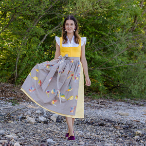 Dirndl in Sonnengelb mit Spatzen Dirndlschürze
