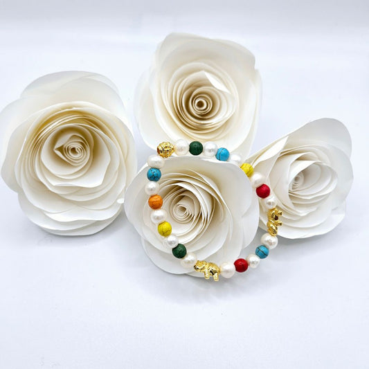 Perlenarmband Valentina mit goldenen Elefanten und Elementen